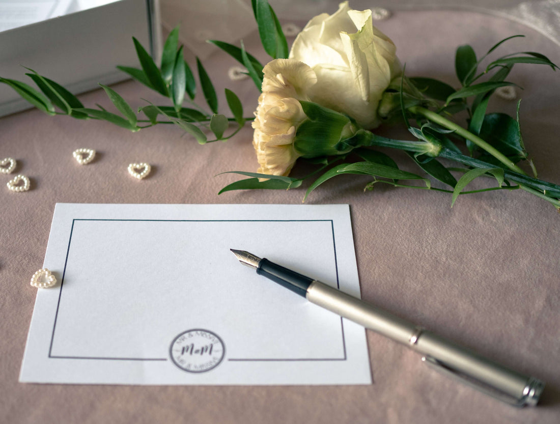 Elegant wedding guest book alternative table with stylish decor and pen